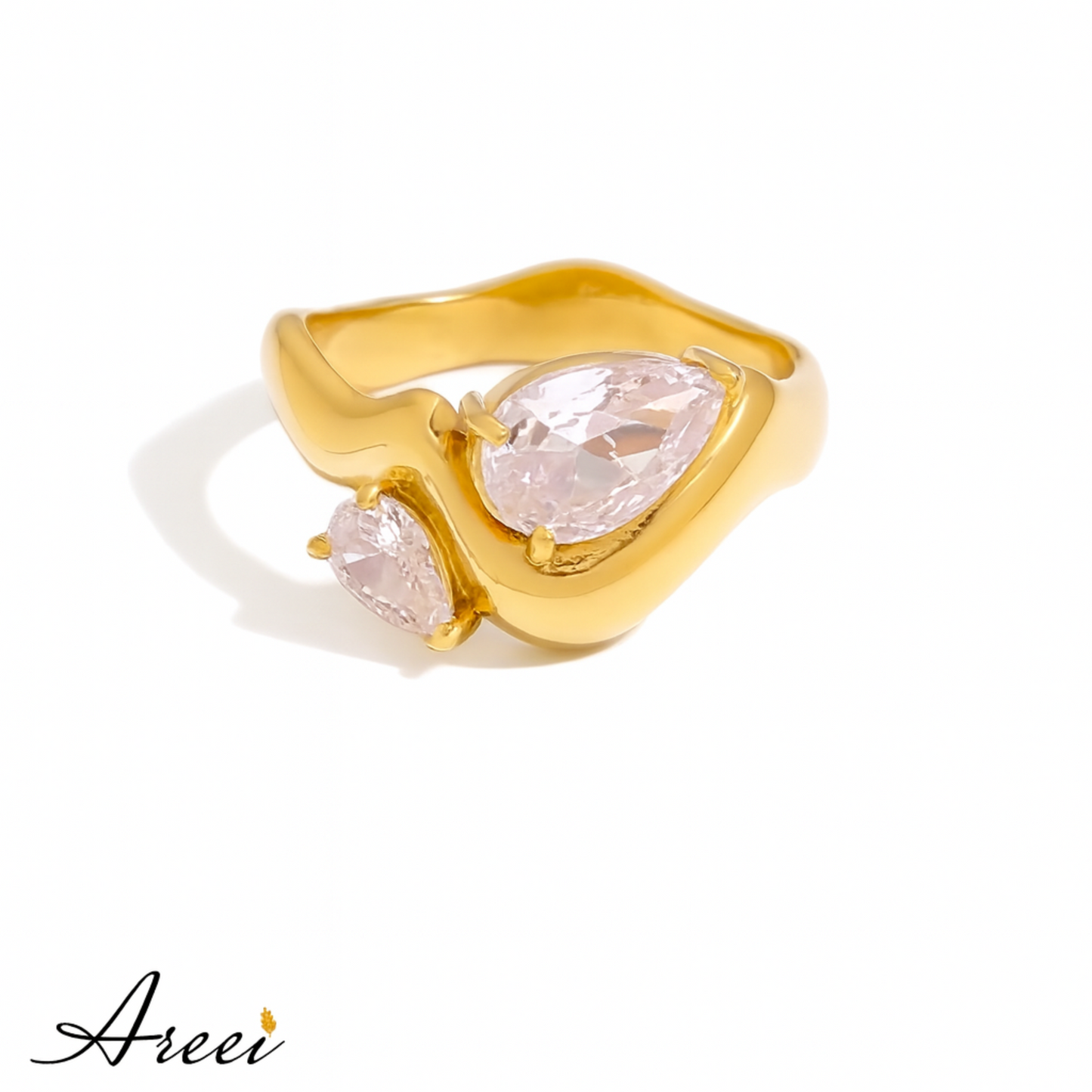 Gold ring with pink gemstones on a white background, featuring the brand 'Areei'.