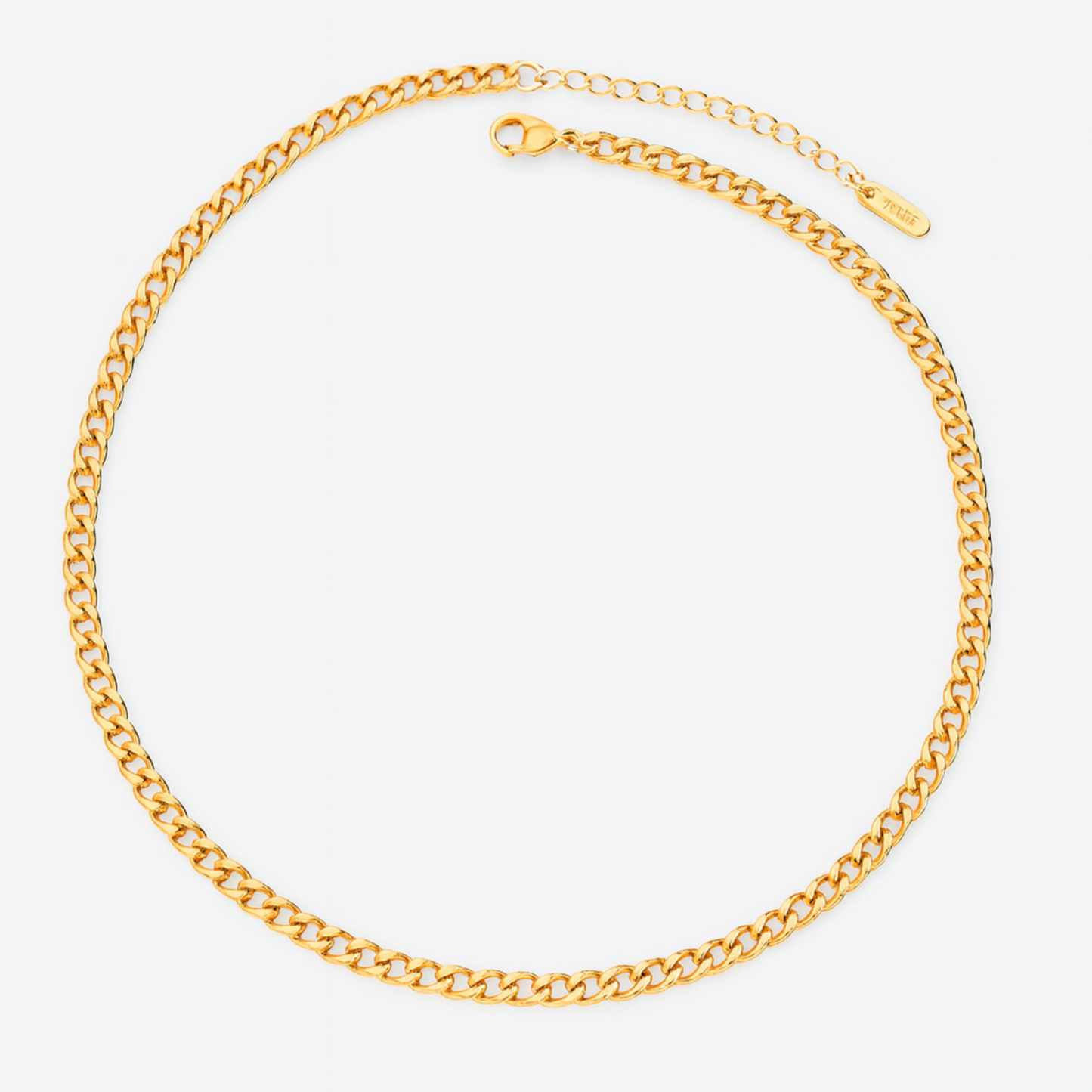 Gold chain necklace on a white background