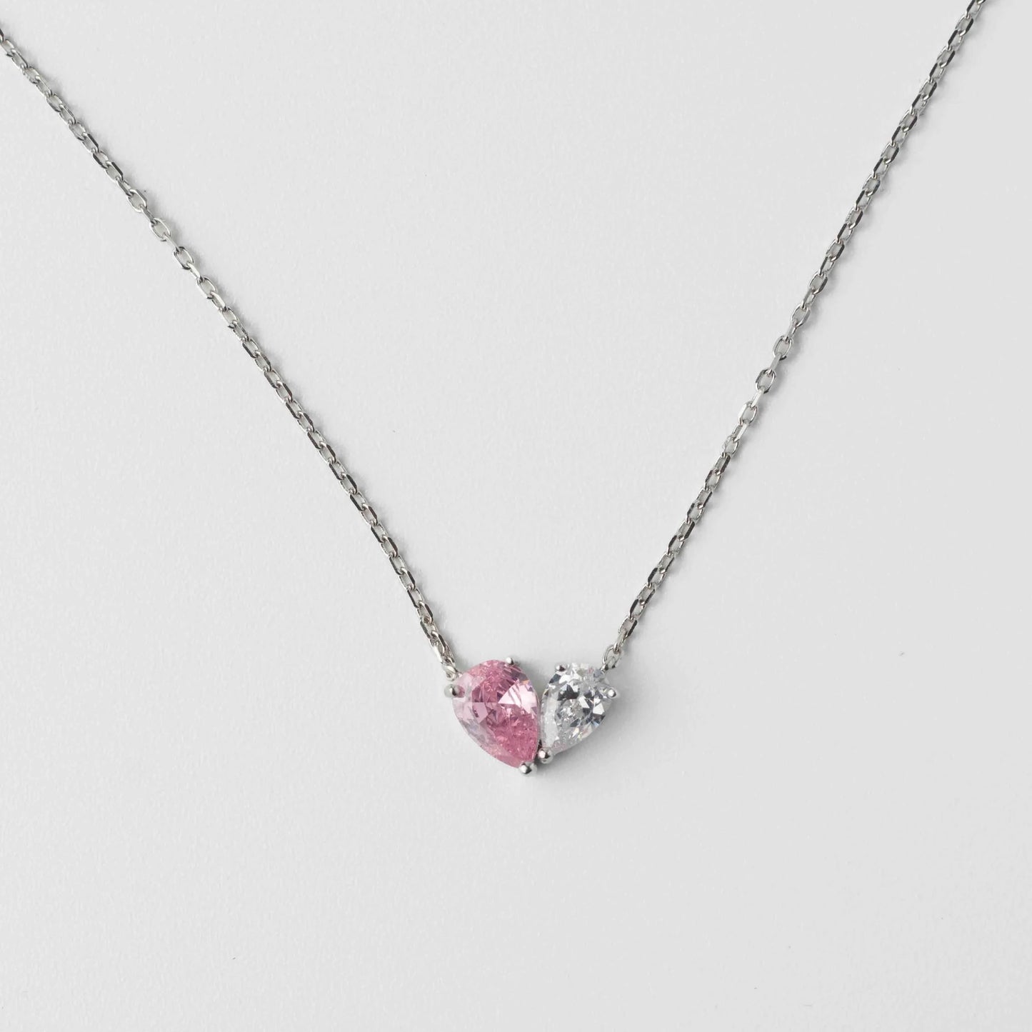 Half pink heart cubic zirconia necklace