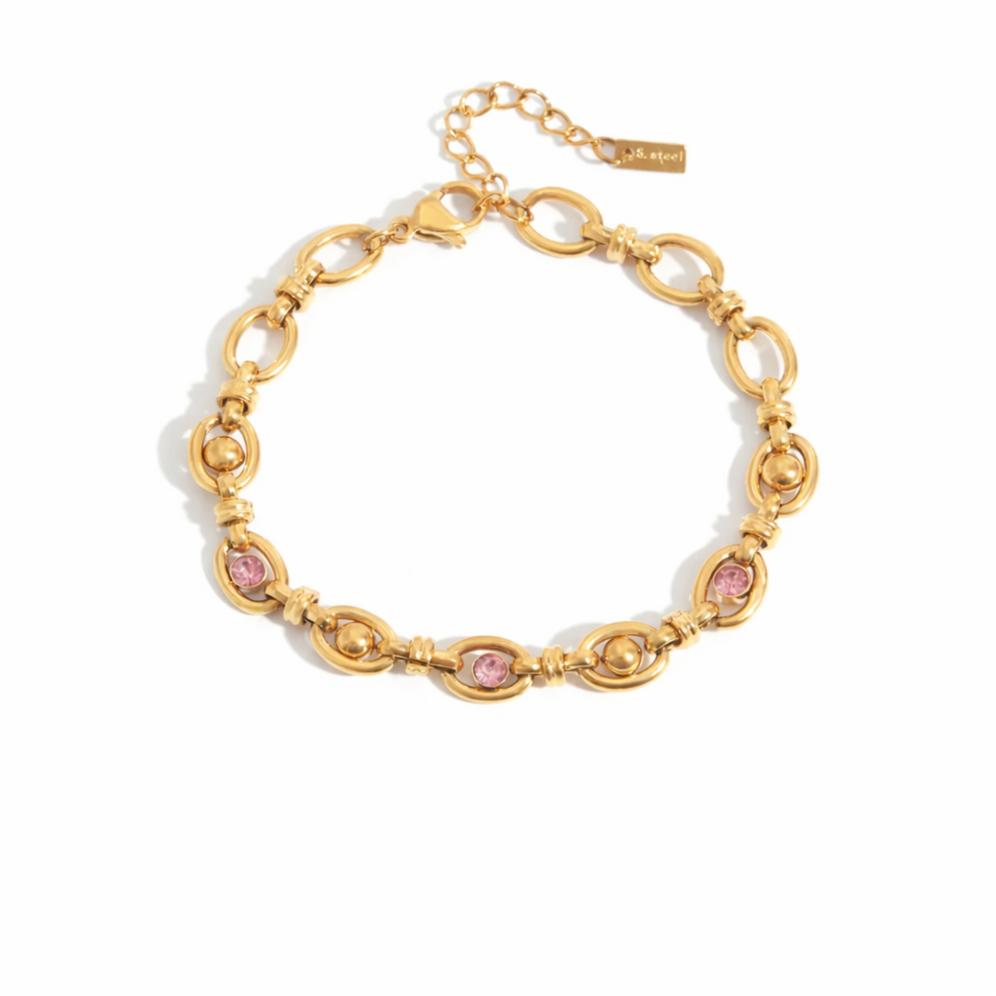 Gold bracelet with pink stones on a white background