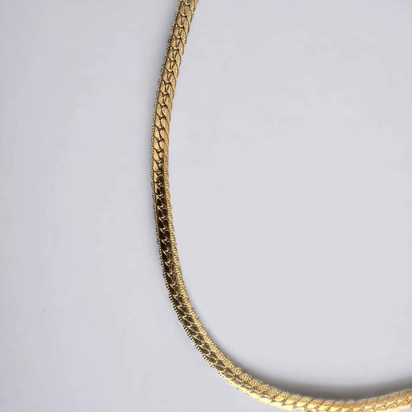 Gold Cuban chain with tight links 