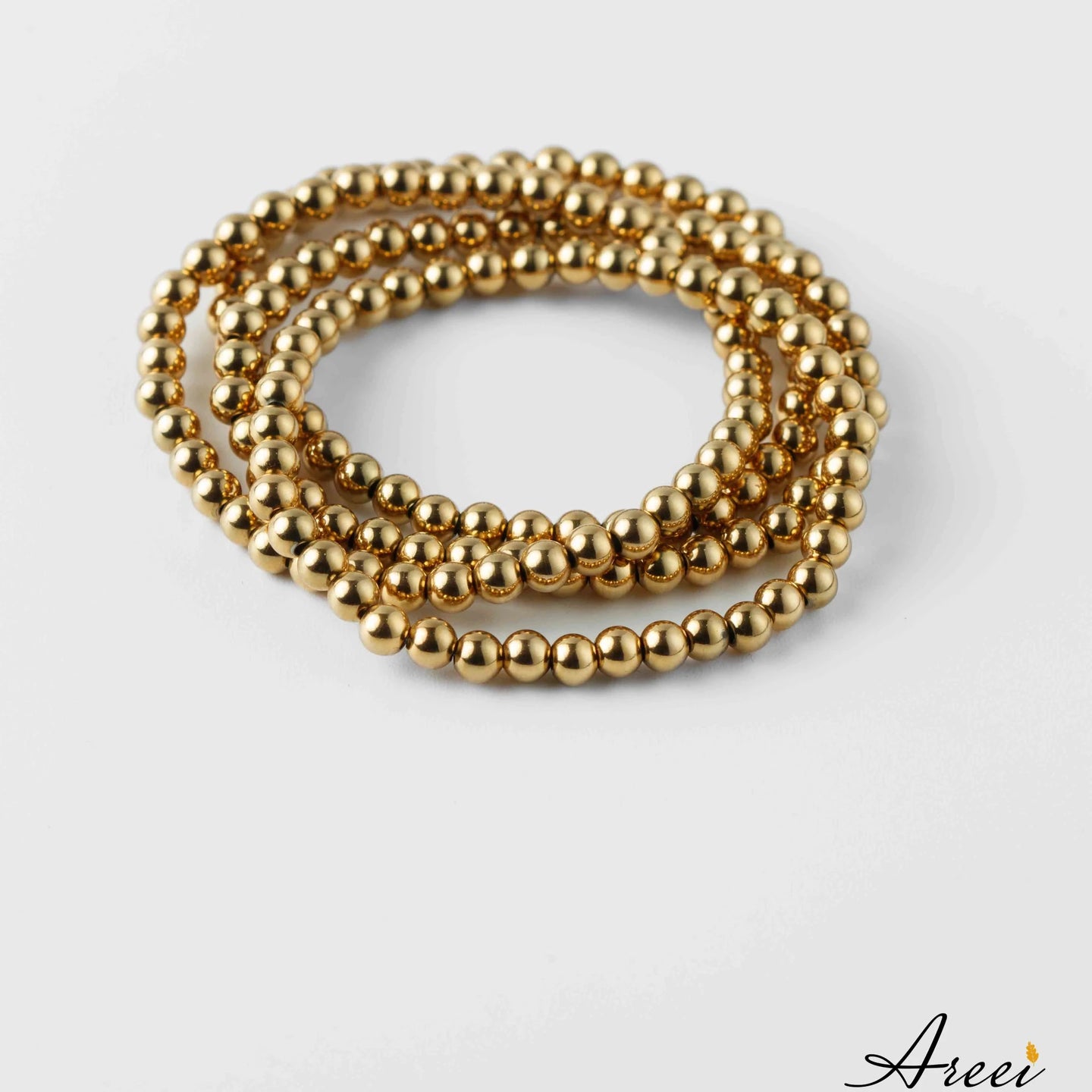 Elastic beaded 18k gold plated bracelet