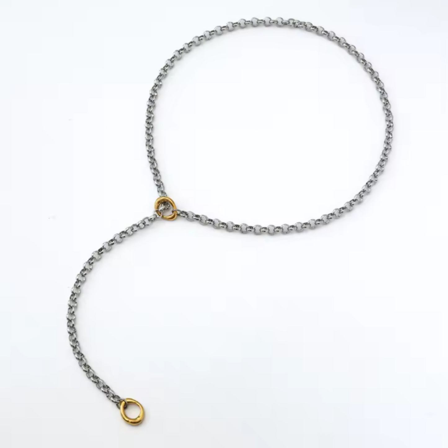 Silver chain necklace with gold clasp on a white background