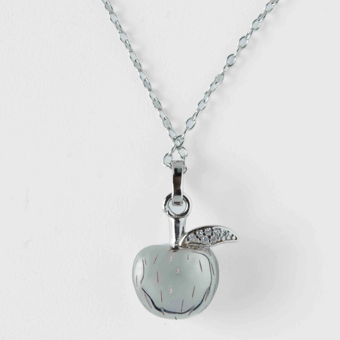 Sterling silver apple with moisannite diamonds