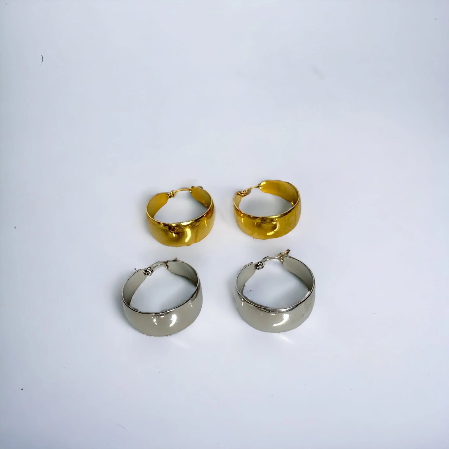 Chunky gold and silver hoop earrings