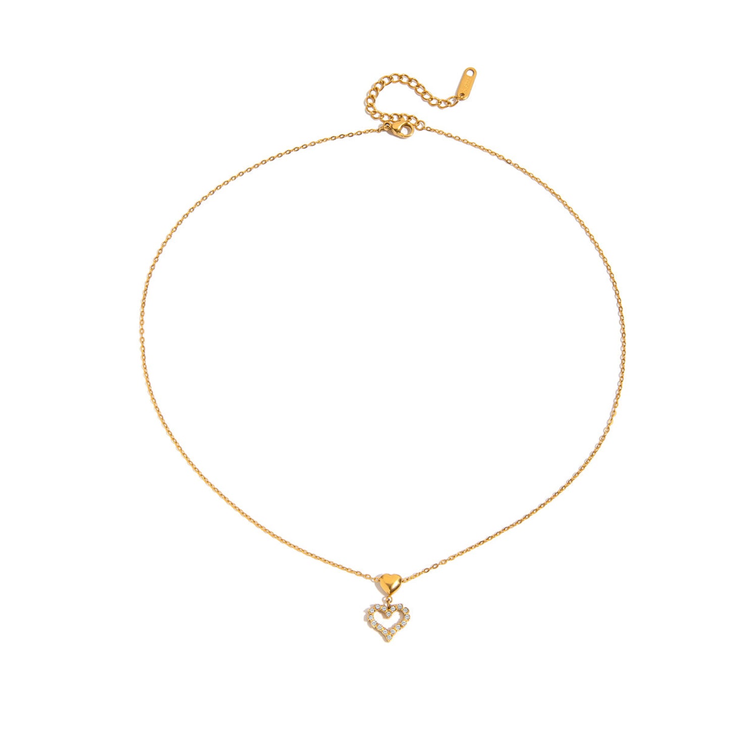 Gold necklace with a heart-shaped pendant on a white background